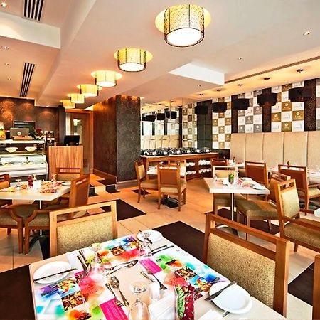 Oaks Liwa Executive Suites Abu Dhabi Restaurant photo